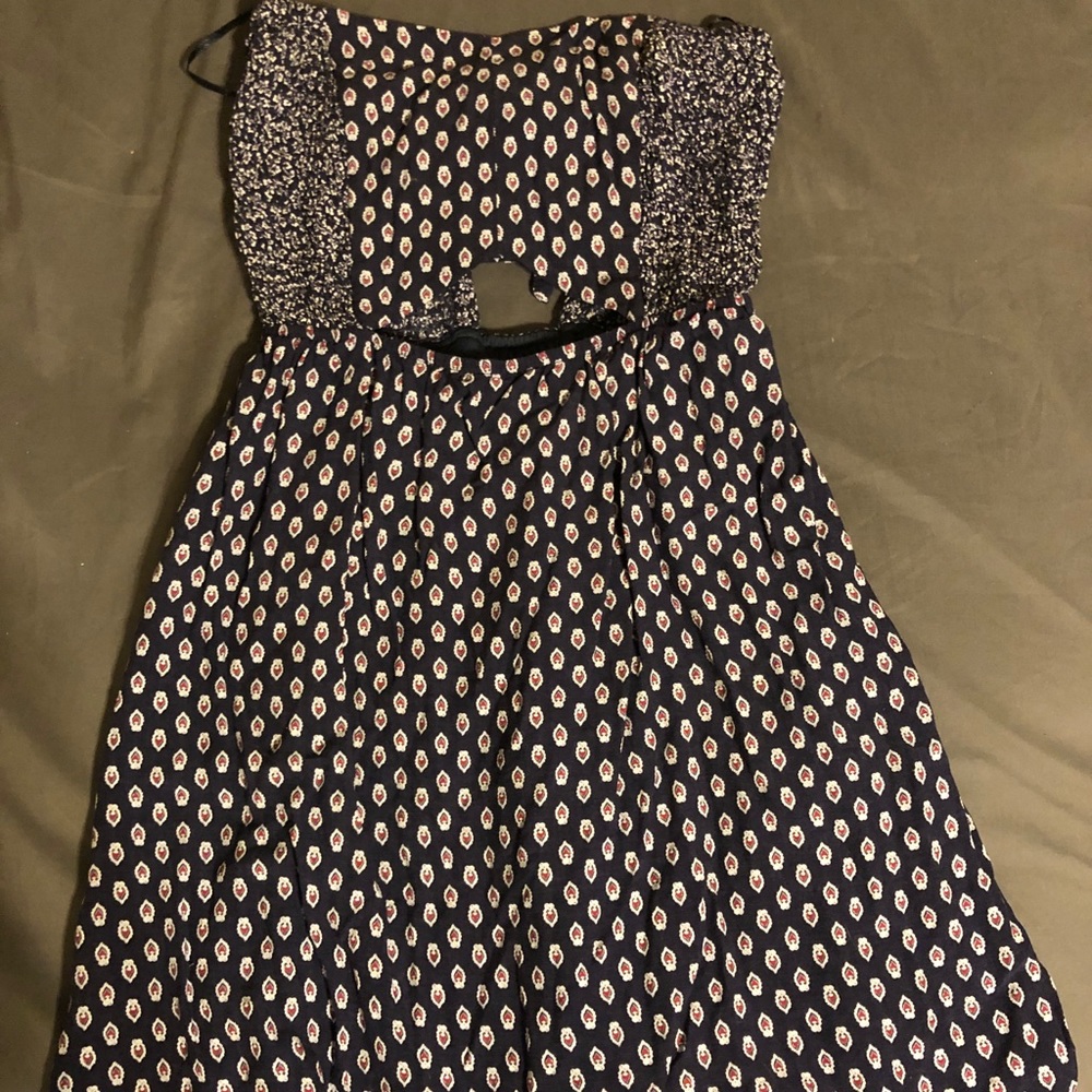 Cute blue sun dress w/opening in front & back